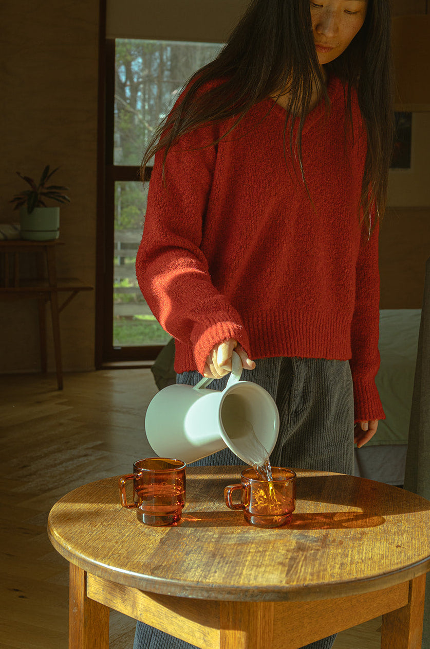 HUM. amber glass mugs styled on a timber table
